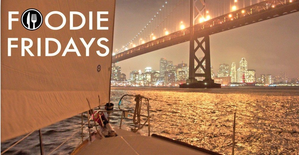 Image of sailboat looking at San Francisco at night