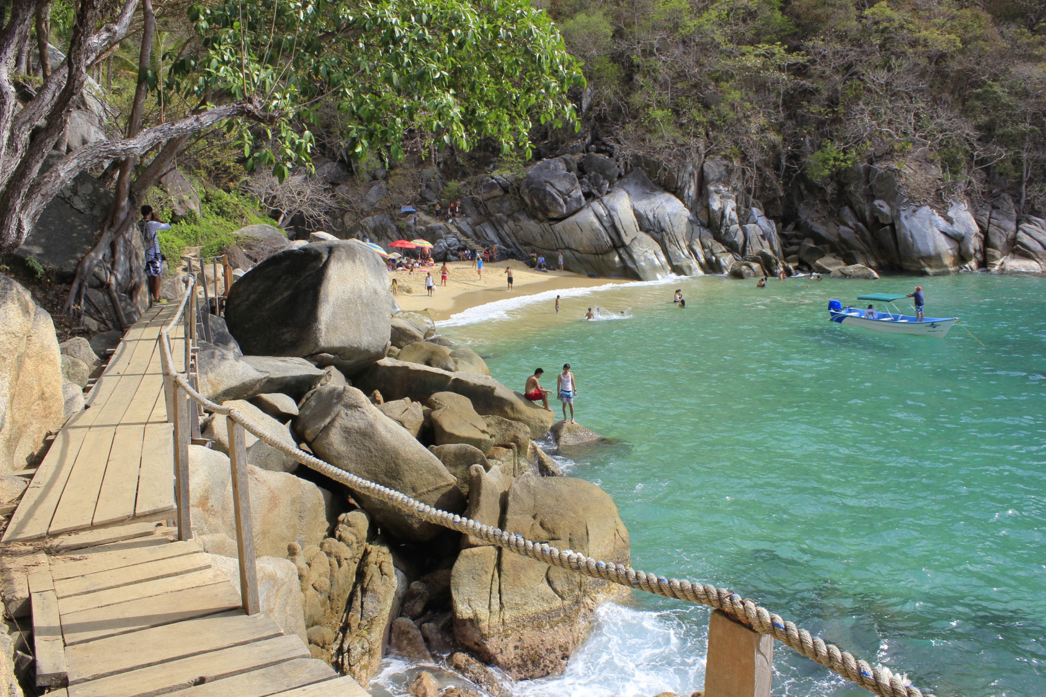 People swimming in a small cove on Banderas Bay